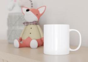 White kids mug mock up. Blank template for your design, advertising, logo. Close-up view. Copy space. Cup standing in children room. Playful cup mockup. 3D rendering. photo