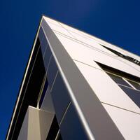 Contemporary Office Building with Clear Sky Background. photo