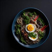 Ramen noodles with egg, hiitake mushroms and egg in black bowl - photo