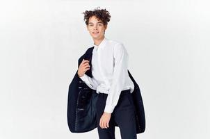 curly-haired guy with a jacket fashion self-confidence business suit photo