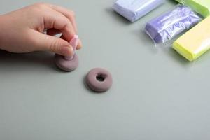 Creating a doll cake donut from air plasticine. Children's creativity DIY photo