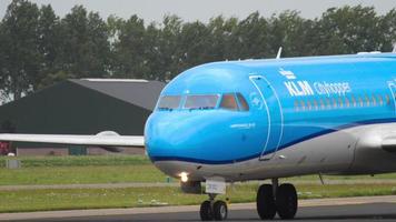 AMSTERDAM, THE NETHERLANDS JULY 25, 2017 - KLM Cityhopper Fokker 70 PH KZB taxiing before departure at runway 36L Polderbaan. Shiphol Airport, Amsterdam, Holland video