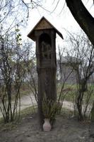 historic wooden Christian chapel in the Polish countryside in Podlasie photo