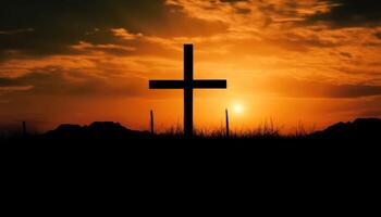 Good friday theme with cross silhouette on golden sunset sky. photo