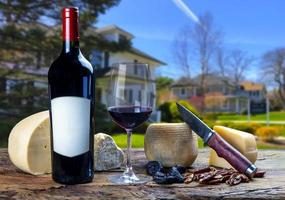 wine red bottle with cheese photo