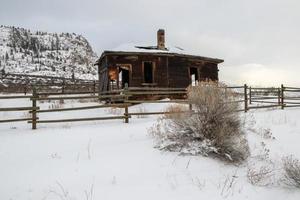 old abandoned ruins on a farm in winter photo