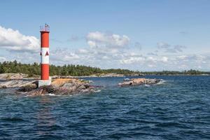 navigation light on the rock shore of Georgian Bay photo