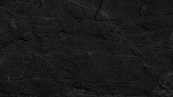 Dark background texture of natural stone photo