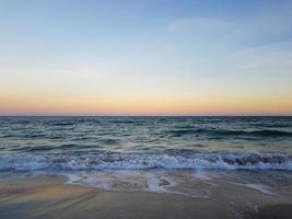 Seascape Sea with calm water and clear sky photo