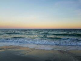 Seascape Sea with calm water and clear sky photo