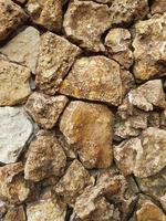 textura de un muro de piedra foto