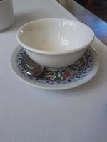 Two empty tea bowls in a restaurant photo