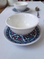 Two empty tea bowls in a restaurant photo