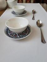 Two empty tea bowls in a restaurant photo