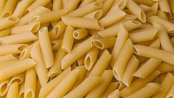 Dry Italian pasta background healthy food photo