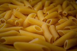 Dry Italian pasta background healthy food photo