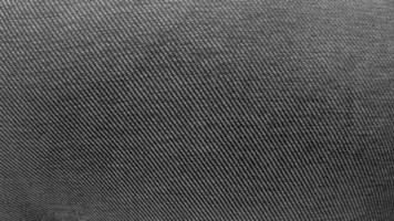Dark black embossed fabric texture photo