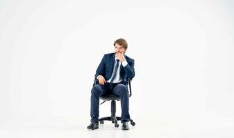 business man sitting in a chair office manager suit photo