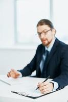 man in a suit at his desk manager work photo