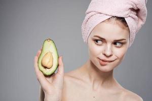 Attractive woman with pink towel on head exotic freshness cropped view photo