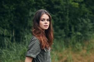 Portrait of a woman green leaves Fresh air travel countryside photo