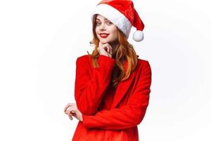 cheerful pretty woman christmas santa claus studio holiday photo