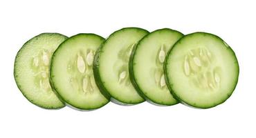 Sliced fresh cucumber on a white background, top view photo