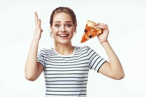 woman in striped t-shirt pizza diet snack junk food photo