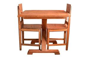 Wooden dining table and chairs isolated. photo