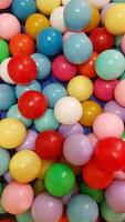 Round colorful plastic balls. Background concept. photo