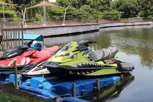 Bogor Indonesia March 2023 Several jet skis lean on the edge of the lake in the Bogor city park. photo