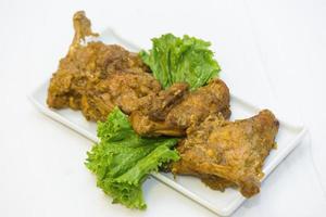 nawabi alimento, pollo asado con salsa. esta tipos de comida son también sabroso y delicioso. foto