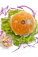 A big size Burger Patties from Ground Beef with Lettuce leaf and Coleslaw Salad. photo