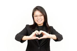 Showing Love Sign Of Beautiful Asian Woman Wearing Black Blazer Isolated On White Background photo