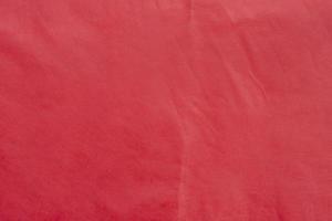 Background and texture of red mulberry paper with wrinkled. photo