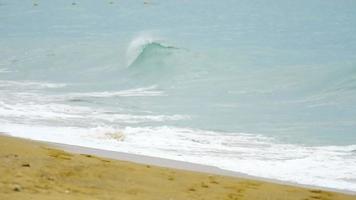 Rolling waves crashing Nai Yang beach, Phuket Thailand video