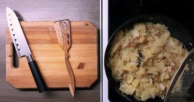 Frying potatoes and onions in a deep pan, top view. video