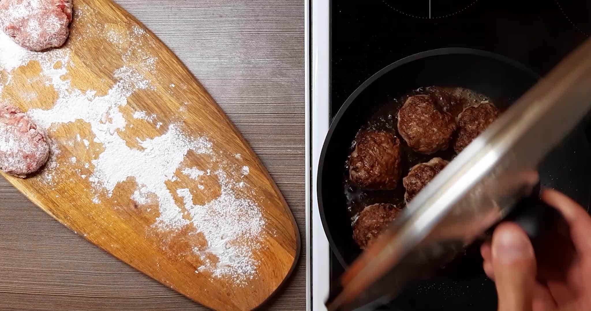 Frying meat cutlets in oil in a frying pan, plate top view. 22470934