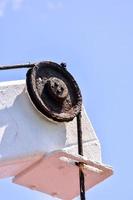 Rusty metal pulley photo