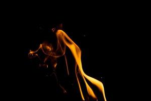 Fire flame isolate on black background. Burn flames, abstract texture. Art design for fire pattern, flame texture. photo