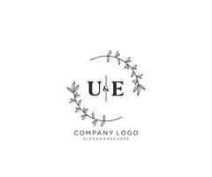 initial UE letters Beautiful floral feminine editable premade monoline logo suitable for spa salon skin hair beauty boutique and cosmetic company. vector