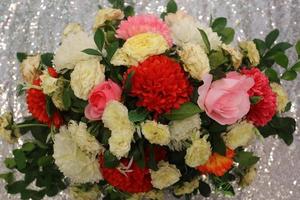 Silver Background Hand made paper flower, Wedding decoration and colorful wedding stage in Bangladesh. photo