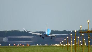 AMSTERDAM, THE NETHERLANDS JULY 27, 2017 - Airplane of KLM Airlines landing and braking at Schiphol airport, rear view. Runway and landing light video