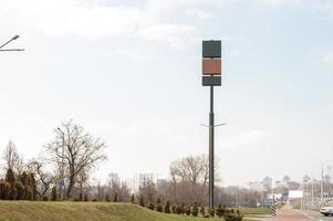Blank billboard mockup on a tall pole. three empty billboards of different textures. wooden shield photo