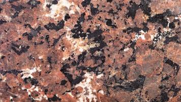 background from polished natural Urtite rock photo