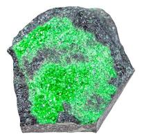 uvarovite crystals on stone isolated photo