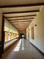 long corridor in historic building architecture background photo