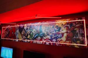 Marvel super heroes poster in red play room. photo