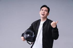 imagen de joven asiático hombre con casco en antecedentes foto
