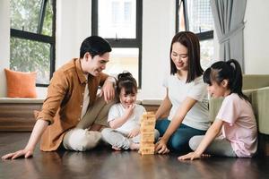 Young Asian family at home photo